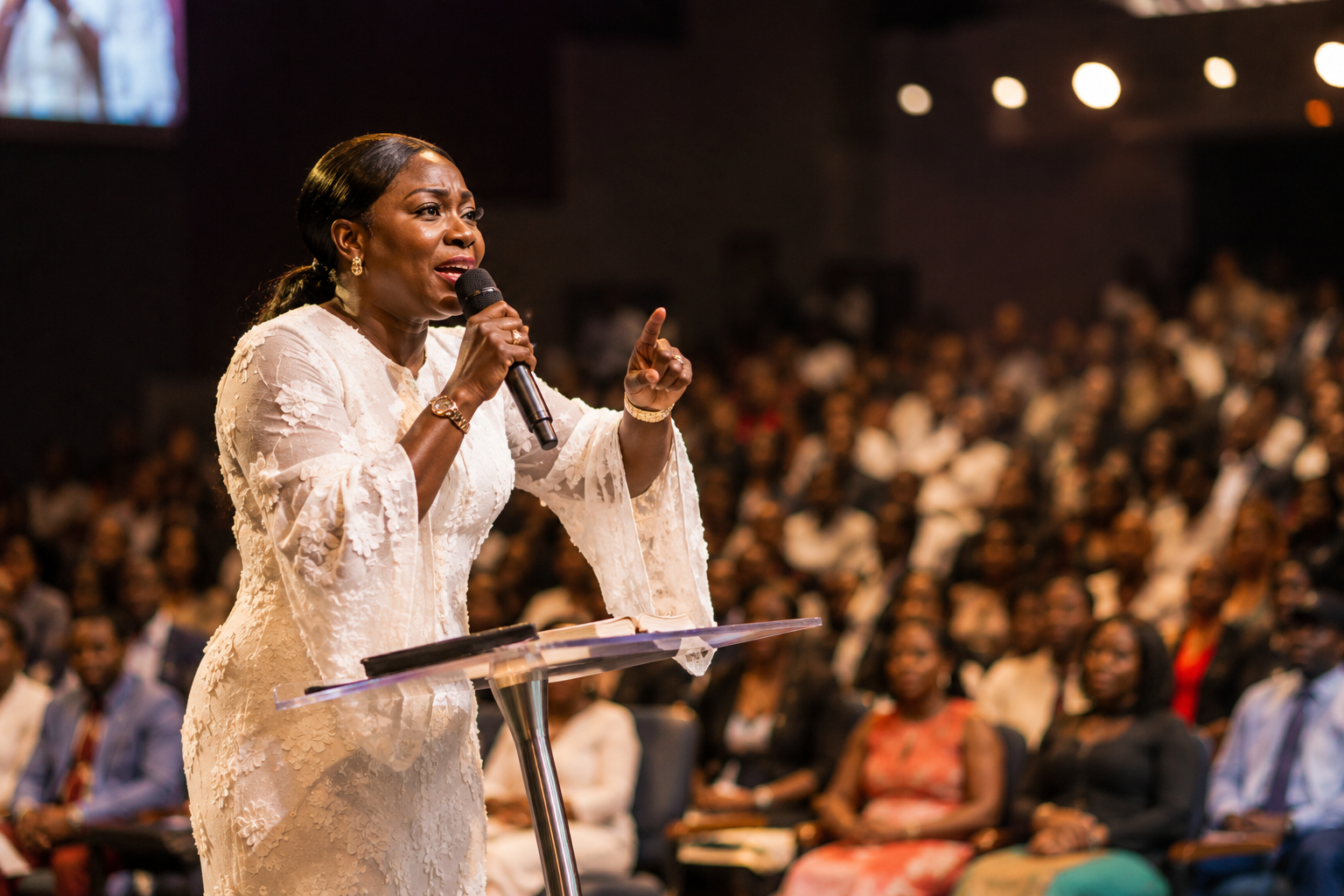 Pastor Deborah M. Fashola preaching to the congregation
