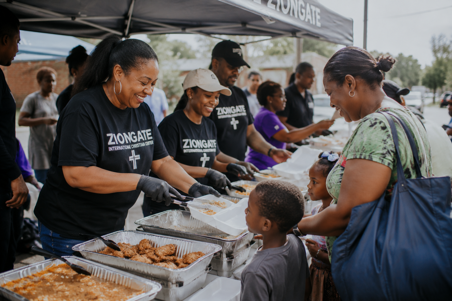 Volunteers serving the community at an outreach event